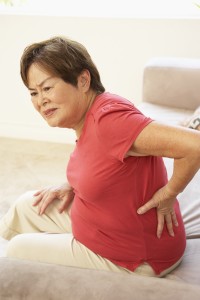 Older Woman with back pain - Alexander Technique can improve back pain