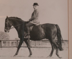 Walter Carrington riding a horse